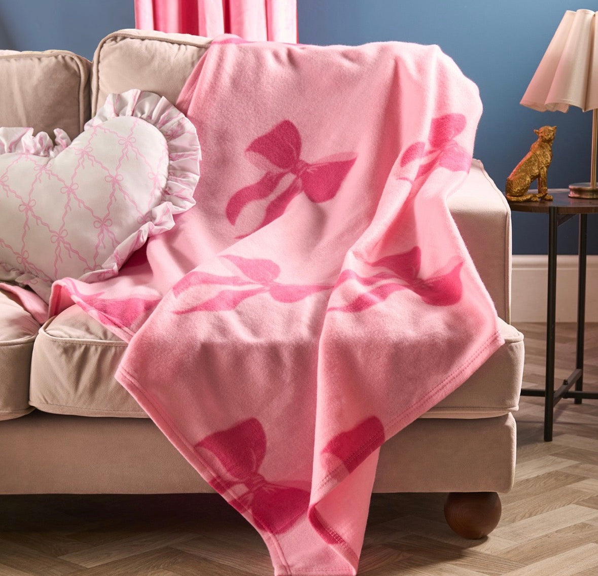 Bow print pink throw